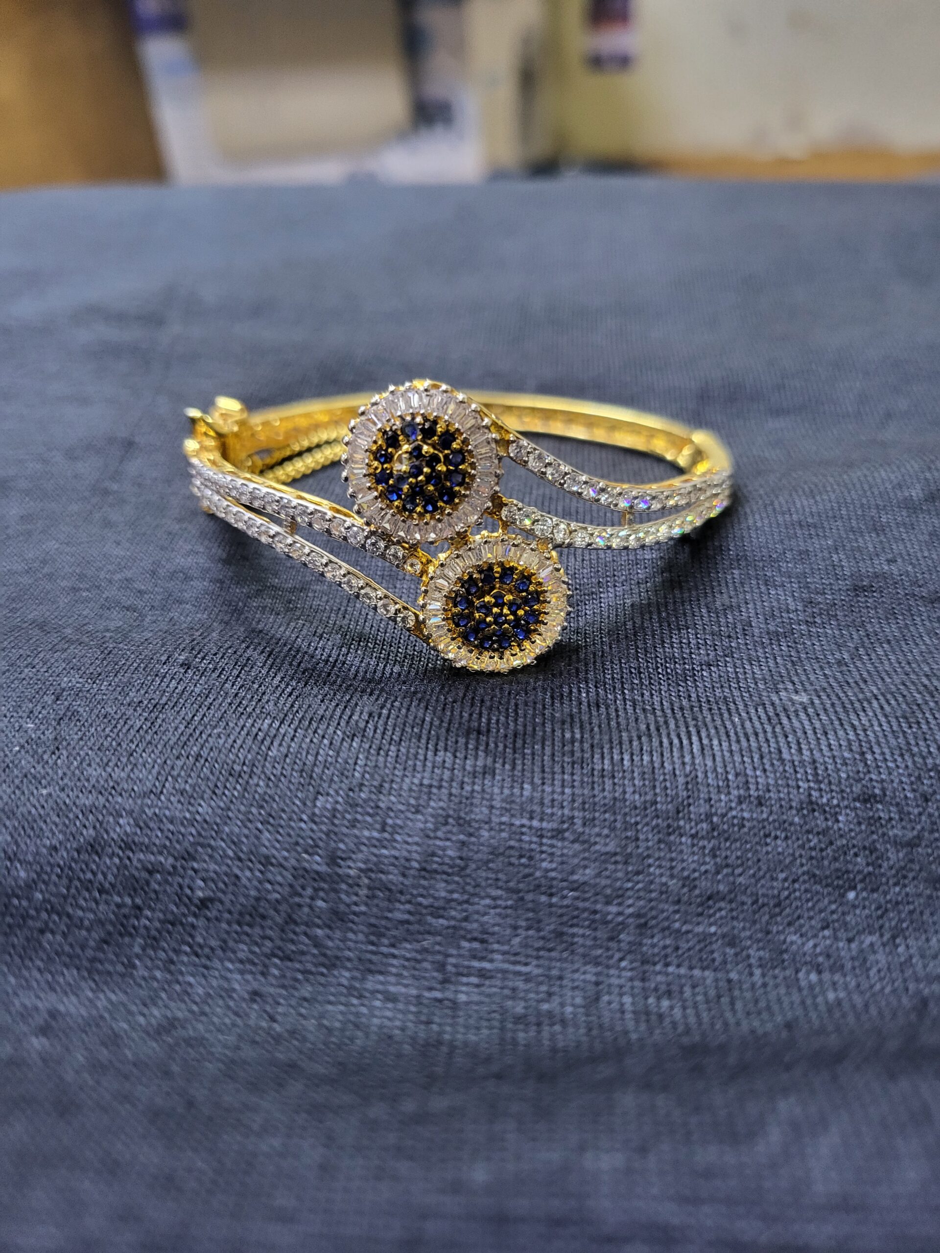 Midnight Radiance Bangle – Dual Halo Gold-Plated Sterling Silver Bangle with Blue and Clear Zircons | Big Jewellery - Image 1