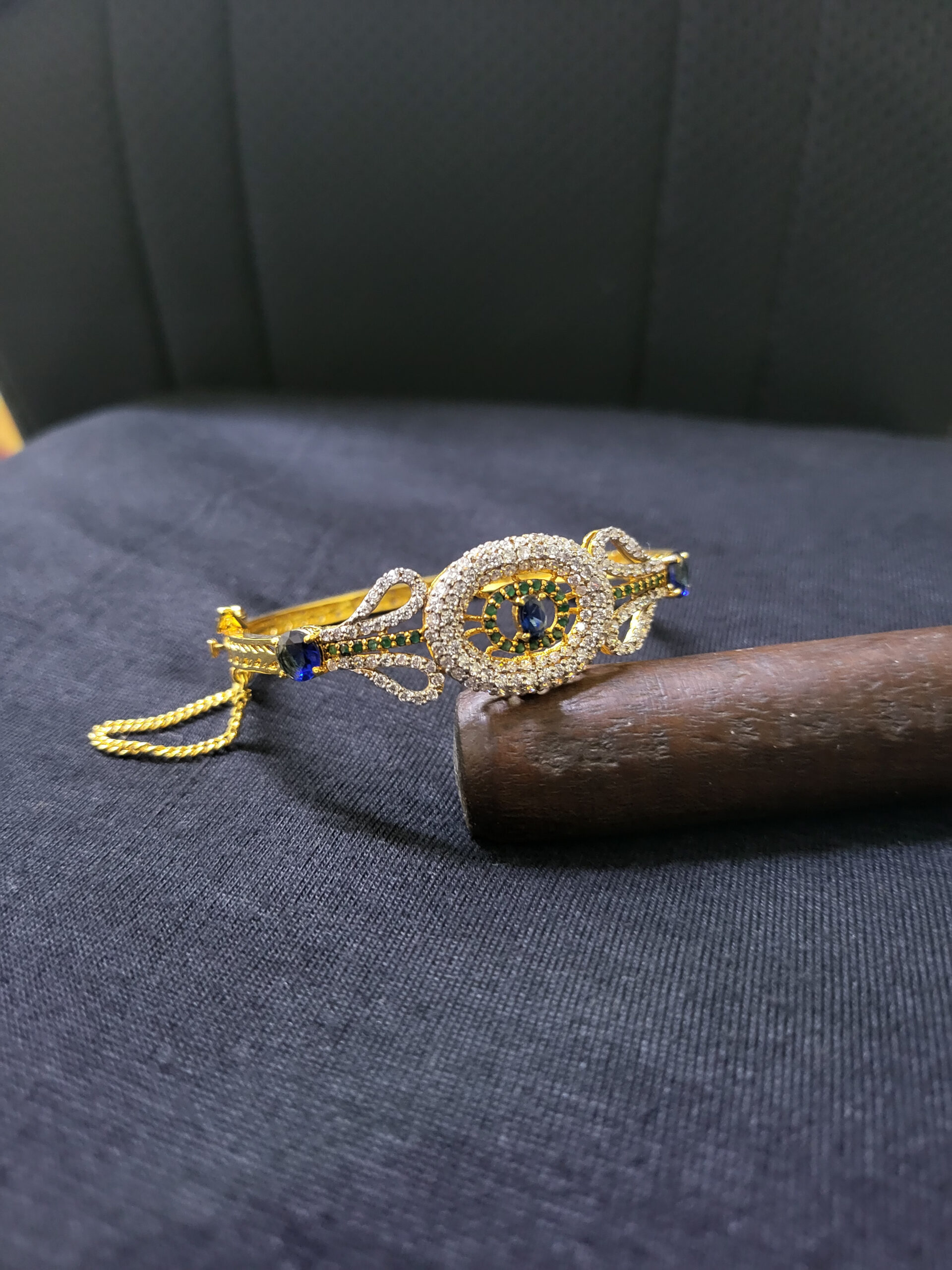 Royal Sapphire Embrace Bangle – Gold-Plated Sterling Silver Bangle with Blue and Green Zircons | Big Jewellery - Image 1