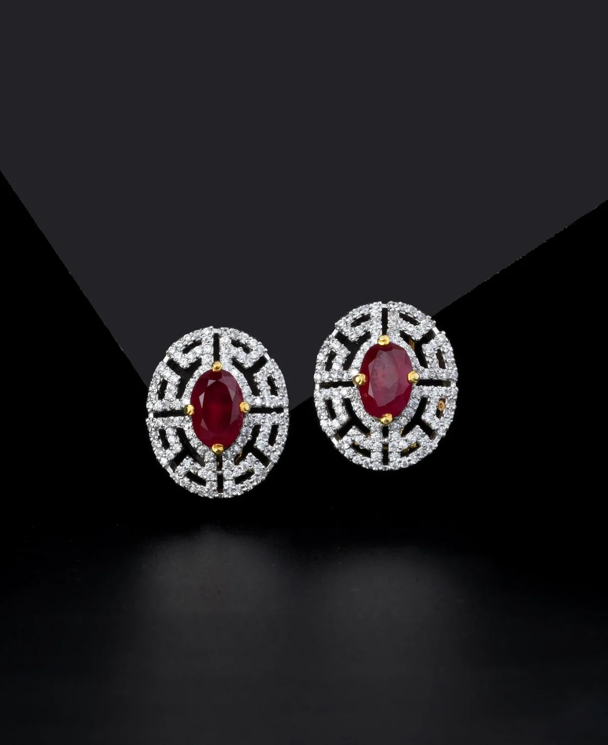 Chetum Maze Studs Chetum Maze Studs – Rhodium-Plated Sterling Silver Stud Earrings with Treated Rubies & Clear Zircons - Image 1