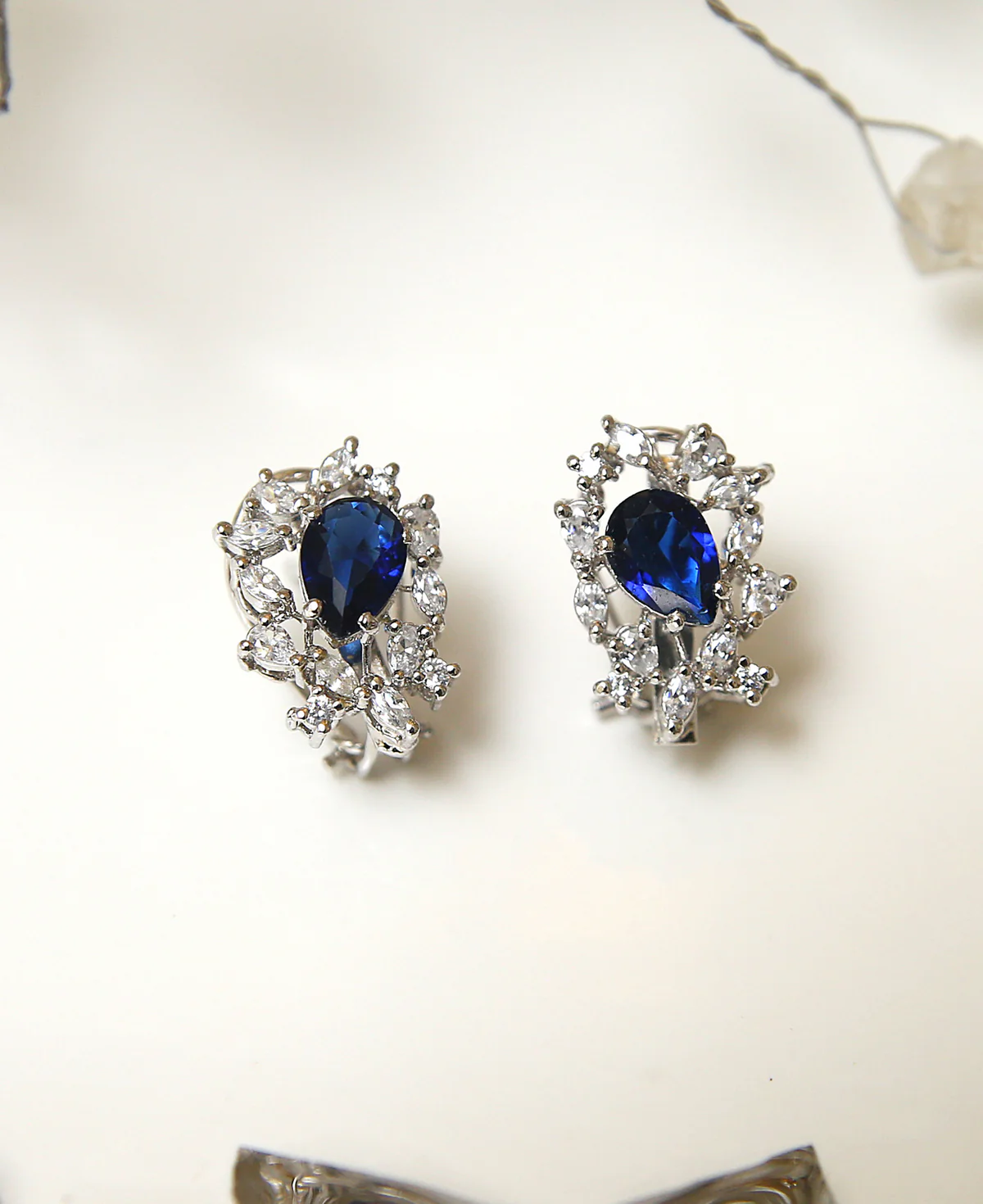 Lady Diana Studs Lady Diana Studs – Sterling Silver Sapphire Blue & Clear Zircon Earrings | Rhodium Finish | Big Jewellery - Image 1